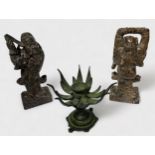 A Tibetan bronze opening lotus incense burner, eight hinged stylised petals twist to reveal