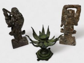 A Tibetan bronze opening lotus incense burner, eight hinged stylised petals twist to reveal
