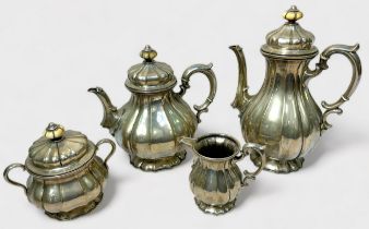 A continental .800 grade silver four-piece tea and coffee set, comprising teapot, coffee pot, lidded