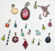 Twenty assorted silver pendants, set with various coloured gemstones, including ruby and tanzanite