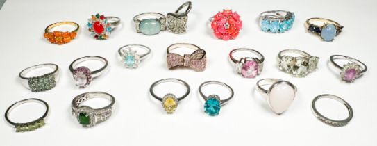 Twenty various silver rings, set with coloured stones and diamonds, total weight 75 grams.