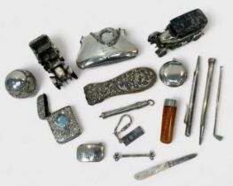 A assortment of various silver collectables including two models of motor cars, a silver collared