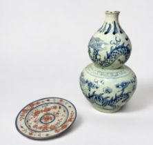 A Chinese blue & white porcelain double-gourd vase, painted in the Ming 'style' with dragons