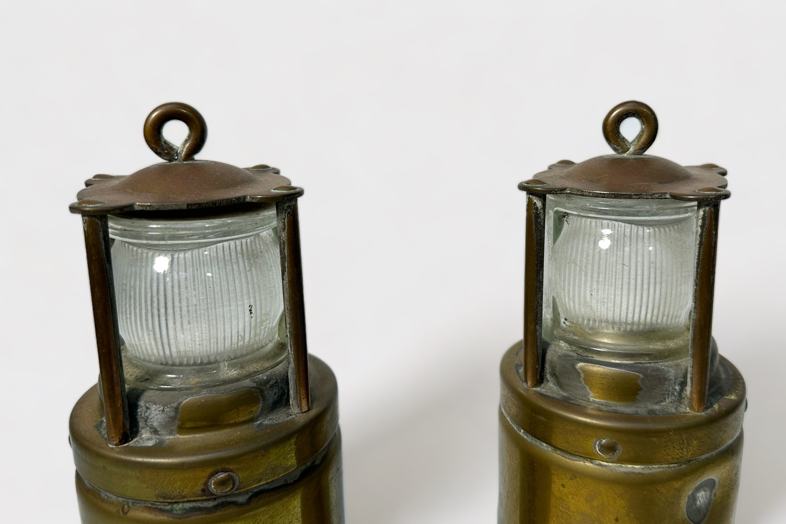 A pair of brass 'Oldham' miner's safety lamps, 27cm high - Image 2 of 3