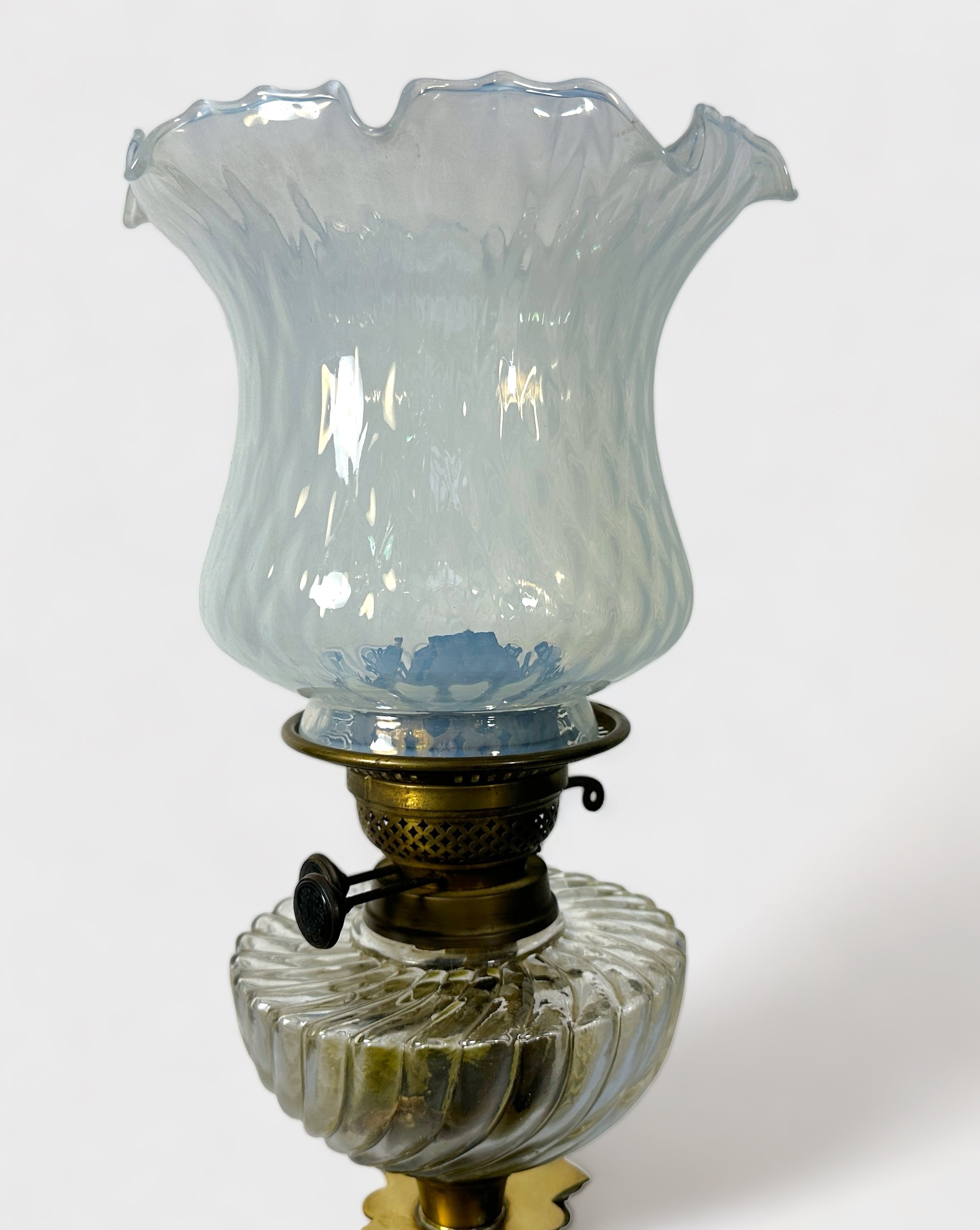 A brass oil lamp modelled as a classical column, with glass reservoir and shade, raised on - Image 2 of 2