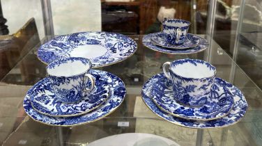 A Royal Cerown Derby part-dessert set comprising three trios of cup, saucer and side plate, together