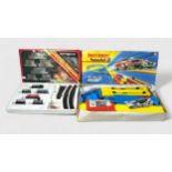 Four various boxed train sets and racing circuits, comprising, Matchbox, Tri-ang and Hornby, to