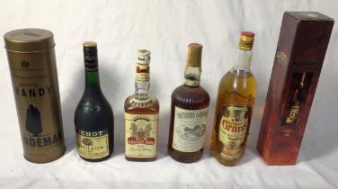 Six various bottles of brandy, whisky and similar liqueurs, comprising, 1970s Southern Comfort, 87.
