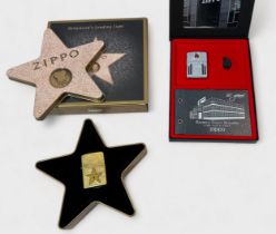 Two cased Zippo collectible lighters, comprising, Zippo ‘Hollywood’s Leading Light’ lighter, 2001