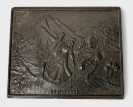 A cast iron rectangular panel, possibly a fireback, moulded with an alpine scene with male and
