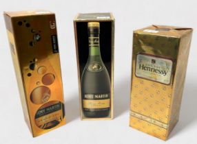 Three assorted boxed bottles of French Cognac, comprising, Remy Martin V.S. Petite Champagne Cognac,