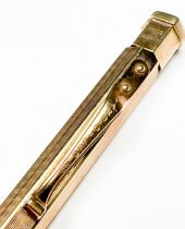 A 9ct Gold 'Yard-O-Led' Propelling Pencil by Johnson Mathey & Co, of hexagonal form with engine