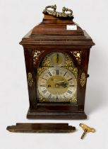 An Edwardian walnut bracket clock, with eight-day twin-train double-fusee movement, striking and