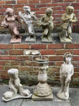 Four reconstituted stone garden ornamental figures emblematic of the seasons, summer, autumn, spring
