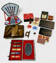 A collection of various cased Chinese calligraphy sets, seals and ink, some seals contained in a