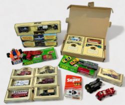 A collection of approximately seventy assorted boxed die-cast scale model vehicles, comprising, 1985