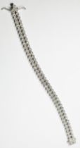 A silver double row diamond set bracelet, estimated total diamond weight 0.50cts, with double
