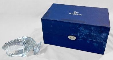 A boxed Swarovski Crystal figure of a bison / buffalo, made of clear cut-glass with faceted head and