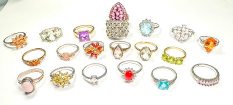 Twenty various silver dress rings, set with diamonds and coloured stones including amethyst and