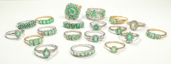 Nineteen various silver emerald and diamond dress rings, total weight 53.6 grams.
