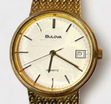 A gents gold-plated Bulova quartz wristwatch, the textured white dial with applied gilt batons