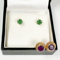 A pair of 18ct gold solitaire emerald earrings, 4 x claw set, each emerald estimated at 0.30cts,