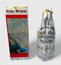 A 75cl bottle of Royal Oporto, 1977 vintage port, in original paper wrapper with card box