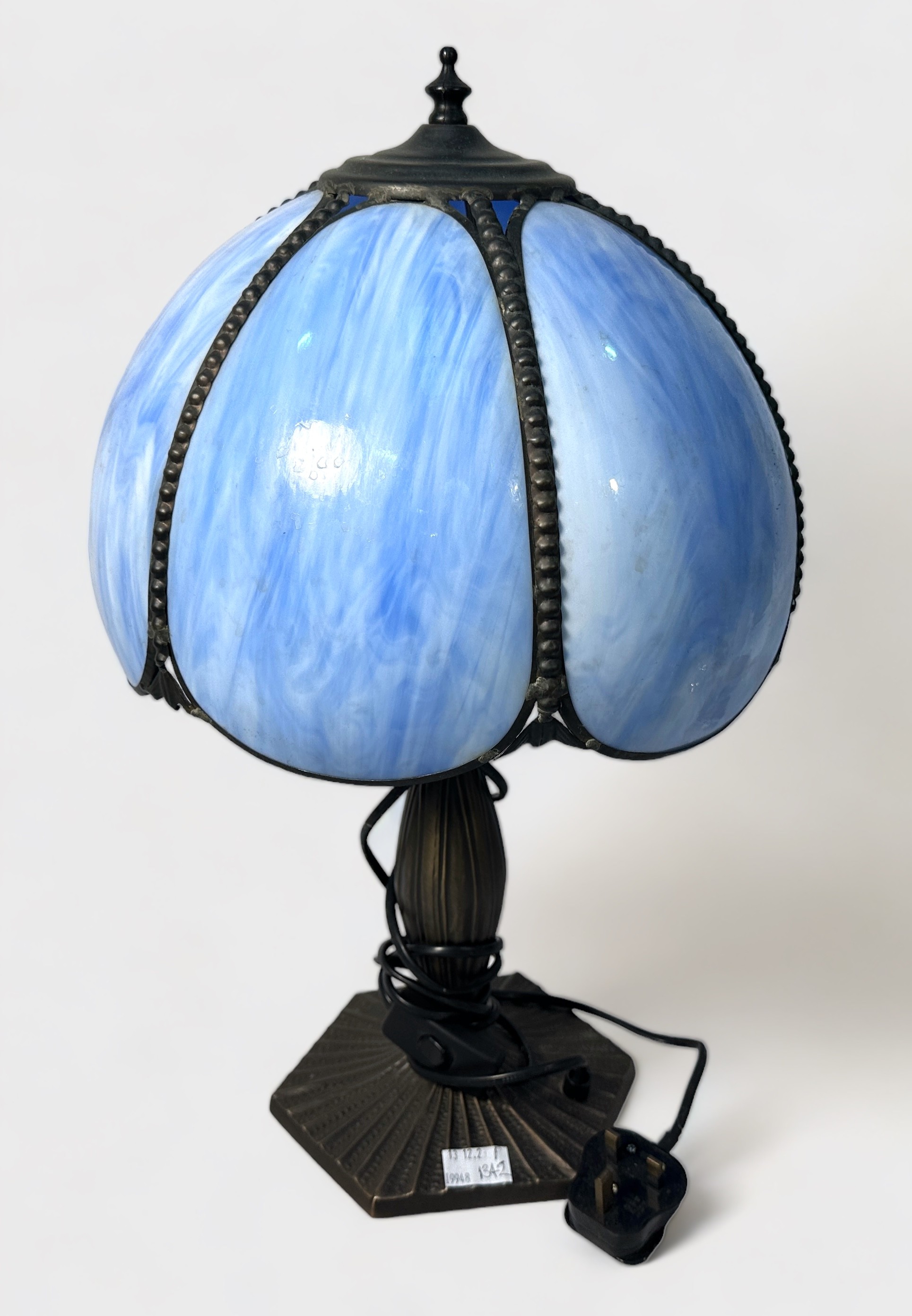 A Tiffany-style lamp with blue petal shade to hexagonal base, approx. 50cm tall