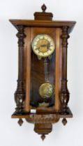 An early 20th century Vienna wall clock, enamelled dial with Roman numerals and brass centre