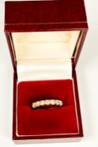 An 18ct yellow gold half-eternity ring, set with 7 x round brilliant cut diamonds, estimated total