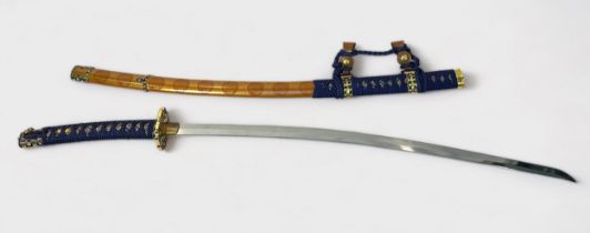 A Franklin Mint ‘The Sword of The Samurai’ replica, bound handle and scabbard, gilt mounts and