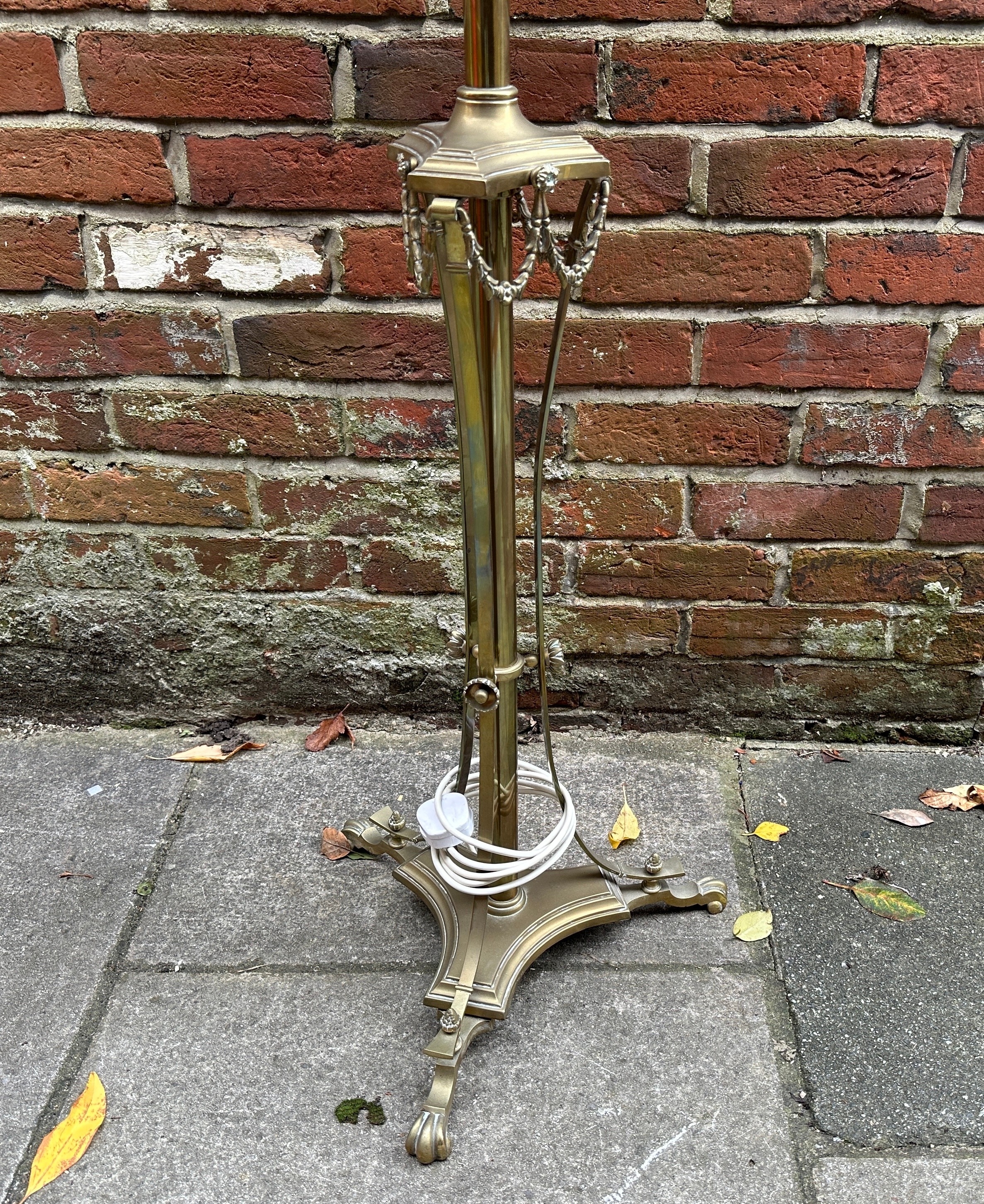 A brass standard lamp of neo-classical form with tripartite base and draped swags - Image 3 of 4