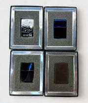 Four cased Zippo Click Collectible lighters, created as part of pilot runs between 2002 - 2005,