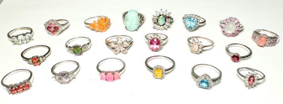 Twenty various silver gem set rings, including diamonds and blue topaz etc, total weight 72.0 grams.