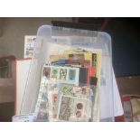 Stamps: Mixed lot in plastic box mostly German, pa