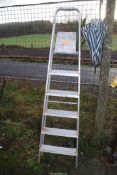 A 5 rung aluminium step ladder.