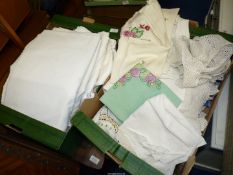 Two boxes of linen to include; table cloths, embroidery, crochet work, etc.