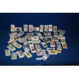 A box of Cigarette cards in sets and part sets including Film Stars, Motor Cars, Sea Fishes,