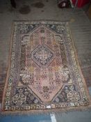 A hand knotted wool Rug with floral central panel and narrow borders, 3' 4'' x 4' 11'',