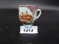 A good 18th century Chinese porcelain coffee can painted in red with a landscape scene against a