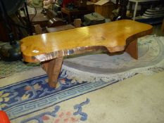 A Maple tree slice topped low Occasional/Coffee Table, 41 3/4'' x 19 1/4'' x 10 3/4'' high.