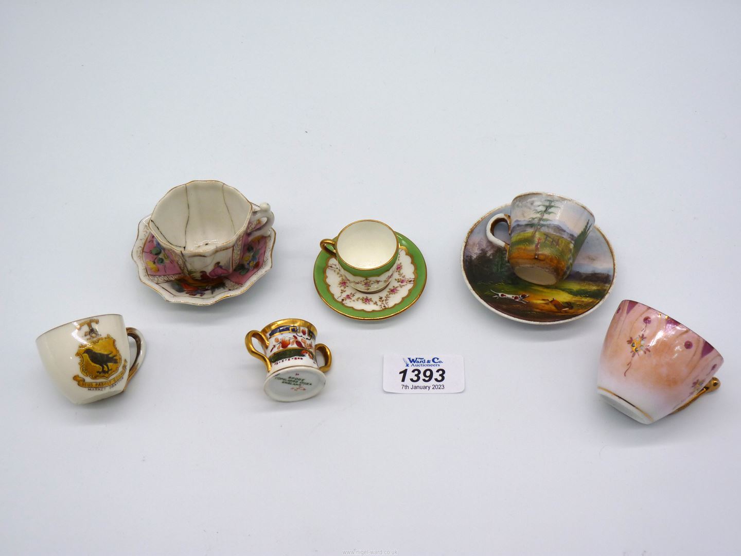 Miniature cups and saucers hand painted with dog and hare, small Coalport cup and saucer,