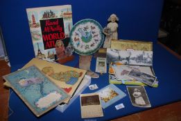 A quantity of miscellanea including postcards, cards, bookmarks, vintage poems and a World Atlas.