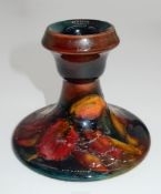 A Moorcroft dumpy Candlestick with Orchid flower, 3 1/2" tall.