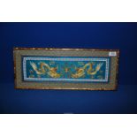 An embroidered picture of two Dragons, in bamboo frame,