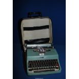 A cased Olivetti lettera 32 typewriter.