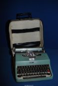A cased Olivetti lettera 32 typewriter.