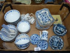 A quantity of oriental china including bowls, rectangular dishes, cups and saucers.