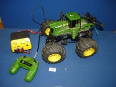 A John Deere remote control Tractor in working order, including charger.