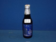 A bottle of Courage, Silver Jubilee 1977 beer, unopened.
